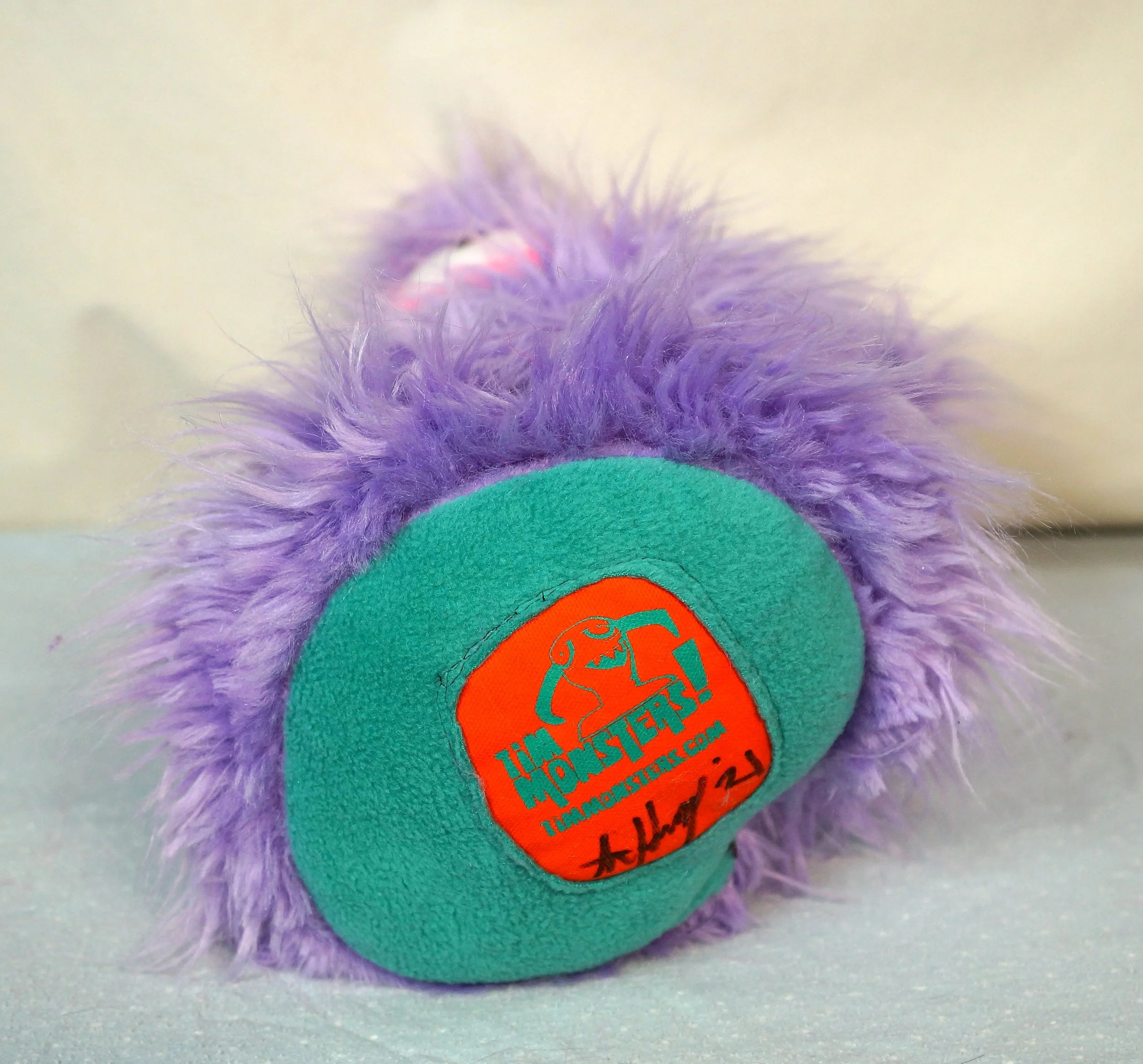 LARGE LIGHT PURPLE MONSTER WITH EARS AND POCKET MOUTH — TIM